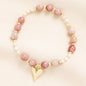 Pink and Gold Beaded Bracelet with Heart Pendant