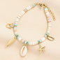 Stainless Steel Summer Shell Charm Bracelet in Gold